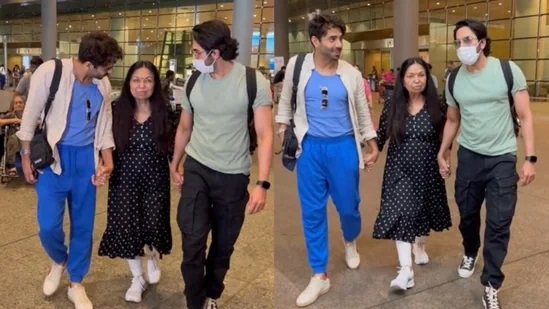 Ayushmann Khurrana and Aparshakti Khurana support their mother as they return to Mumbai after the demise of their father